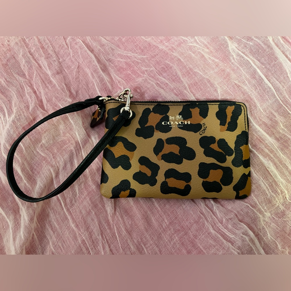 Leopard print Coach wristlet.